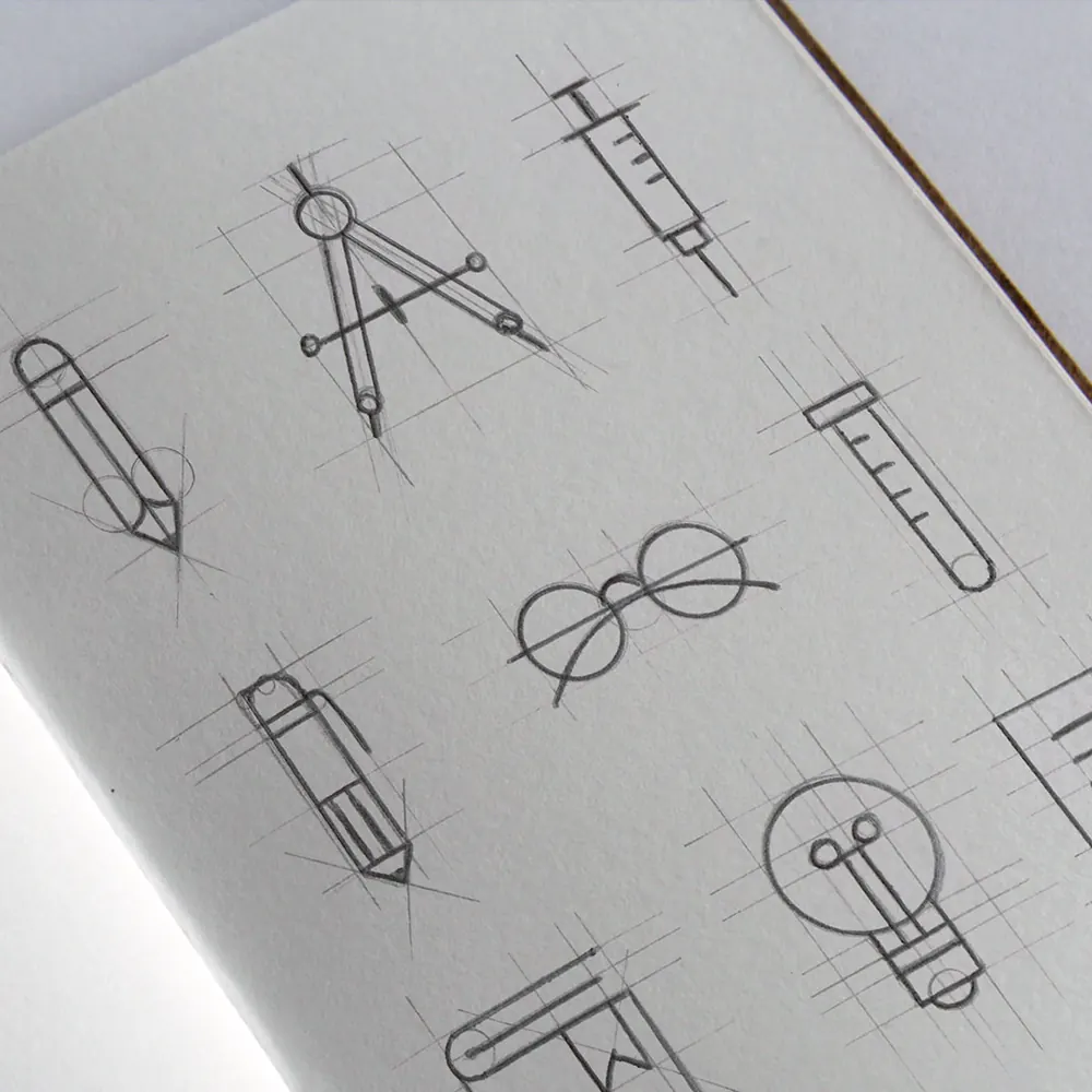 A sketchbook page of pencil drawings with construction lines